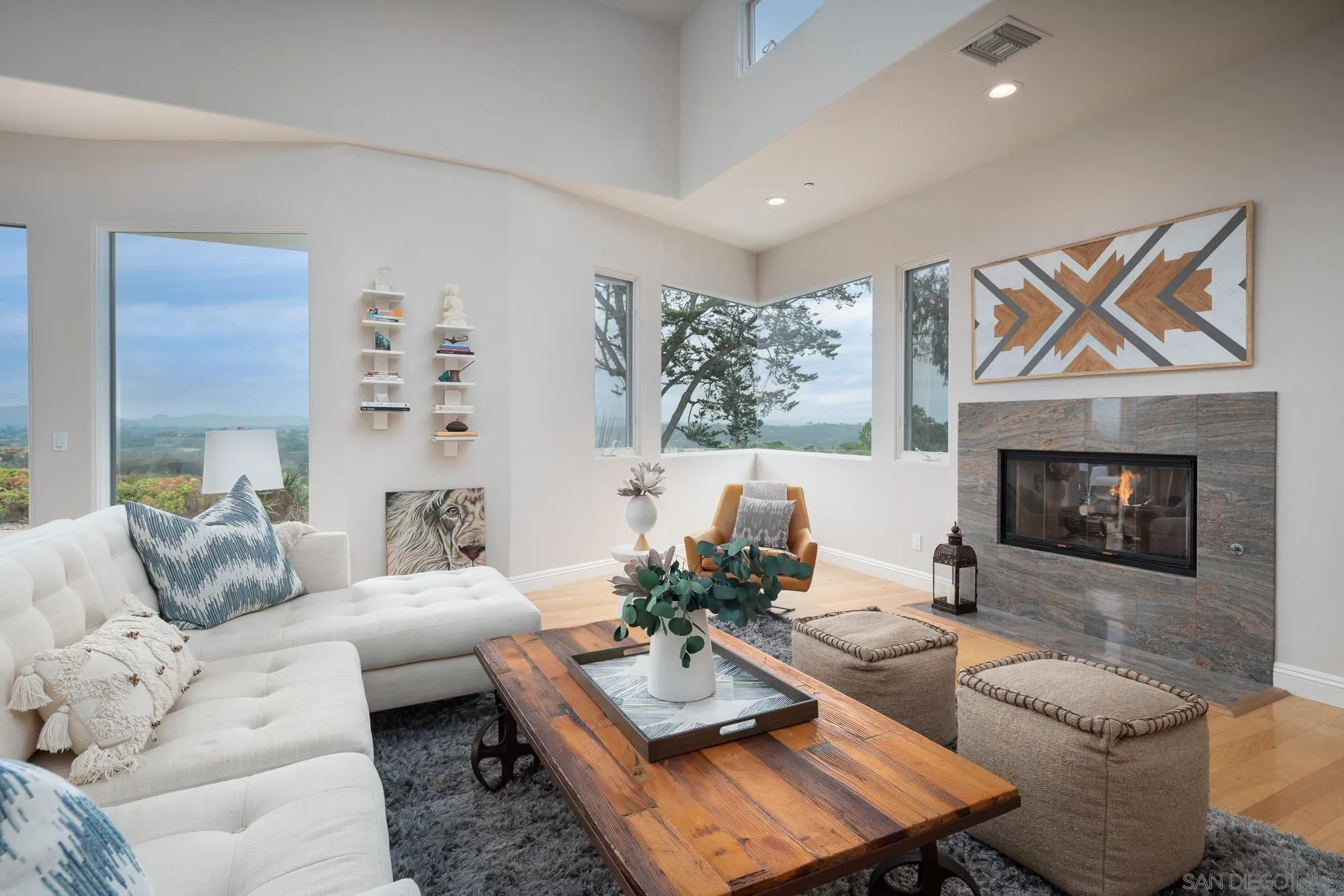 1953 Crest Drive Encinitas, CA 92024 - Photo 24 of 42 a living room with furniture and a fireplace