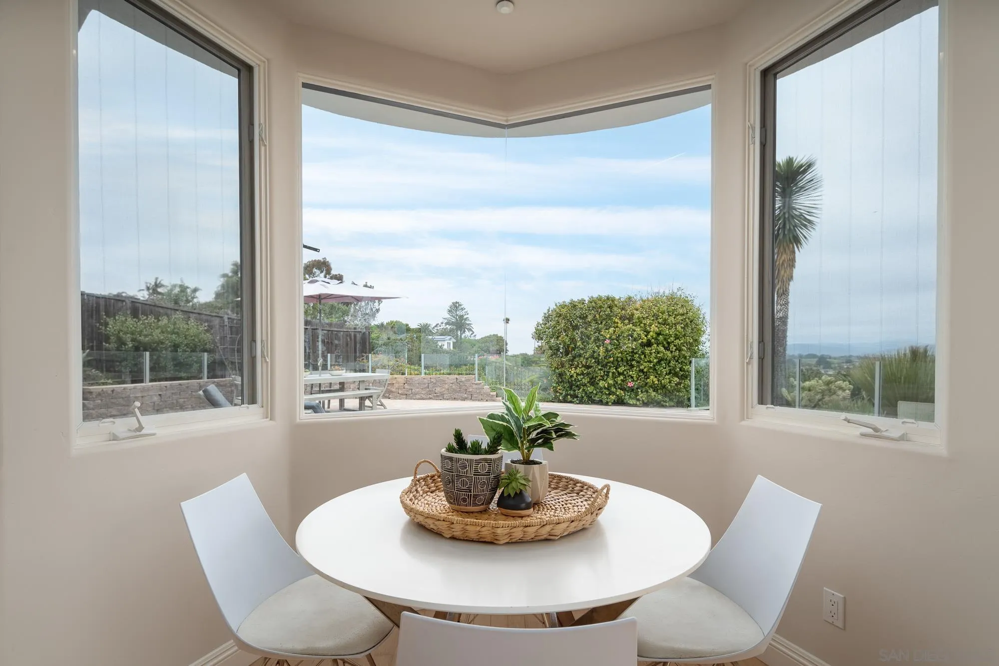 1953 Crest Drive Encinitas, CA 92024 - Photo 29 of 42 a view of a dining room with furniture window and outside view