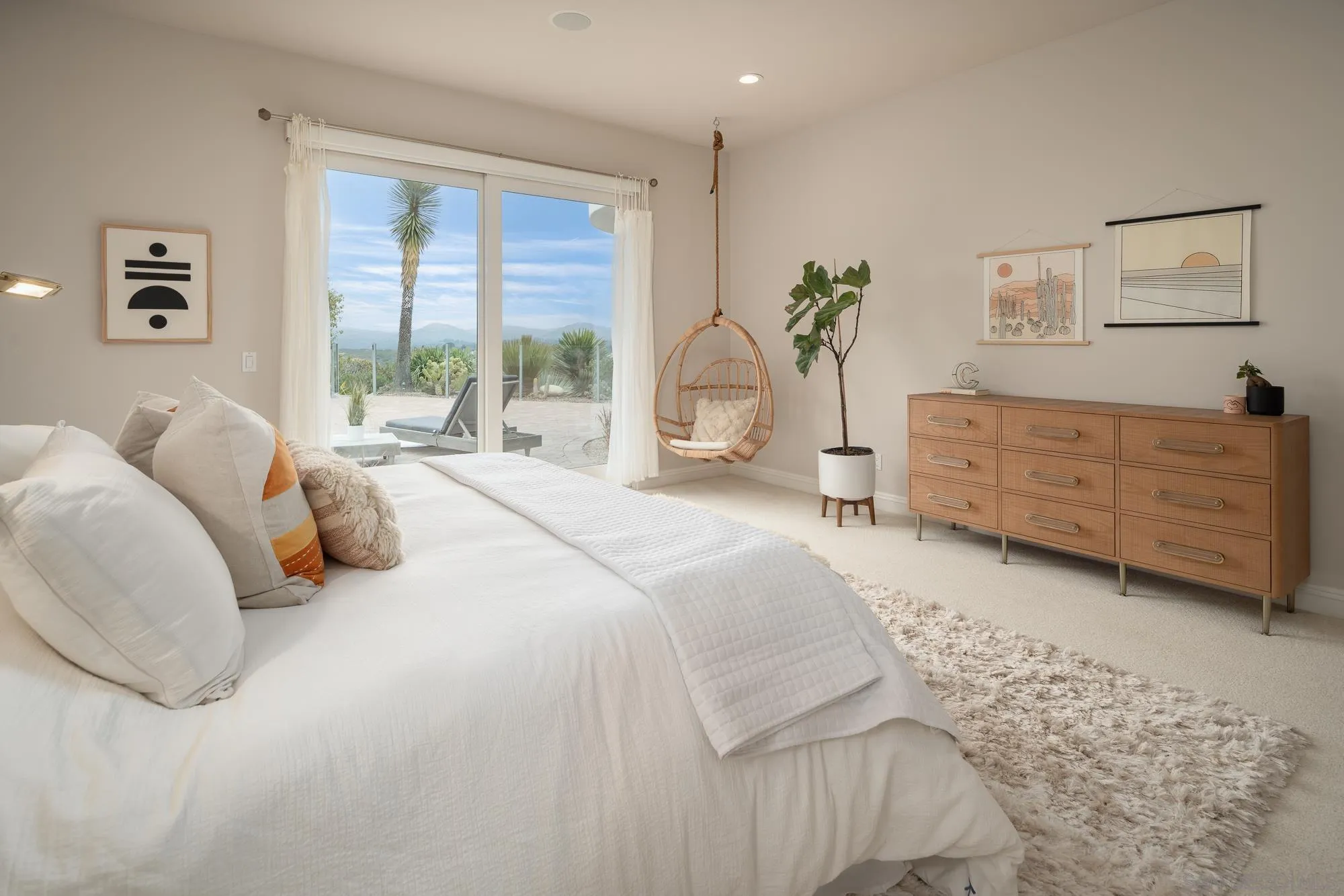 1953 Crest Drive Encinitas, CA 92024 - Photo 40 of 42 a bedroom with a bed dresser and window