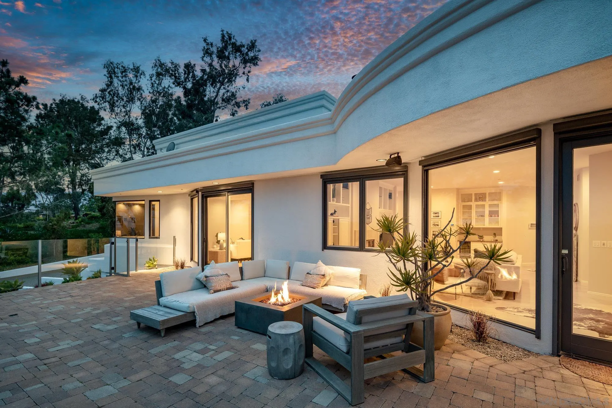 1953 Crest Drive Encinitas, CA 92024 - Photo 5 of 42 a living room with furniture and a floor to ceiling window