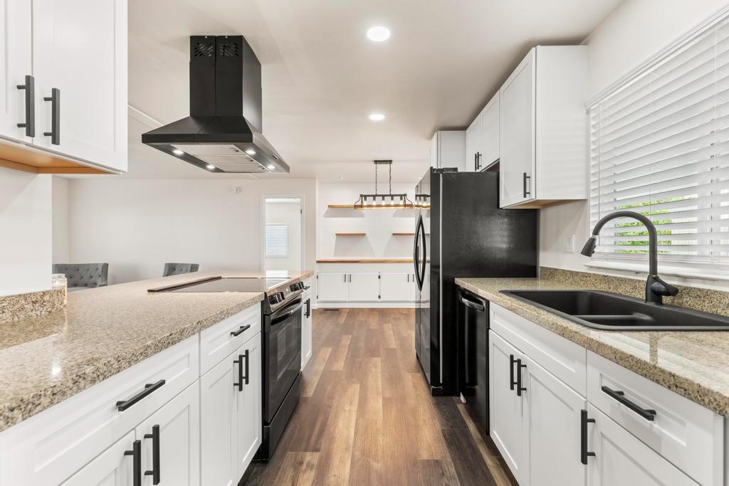 7600 Golden Eye Lane, Unit 43 Citrus Heights, CA 95621 - Photo 11 of 39 a kitchen with granite countertop a sink stainless steel appliances and cabinets