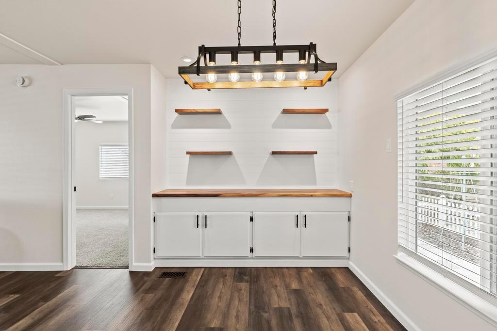7600 Golden Eye Lane, Unit 43 Citrus Heights, CA 95621 - Photo 14 of 39 a view of room with wooden floor and window