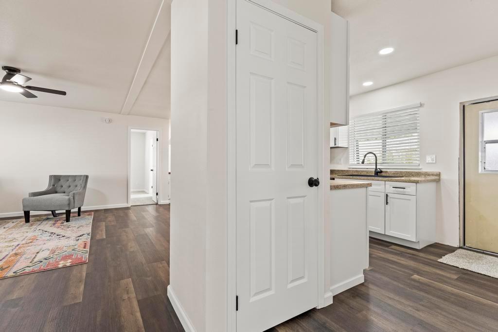 7600 Golden Eye Lane, Unit 43 Citrus Heights, CA 95621 - Photo 16 of 39 a kitchen with cabinets and wooden floor
