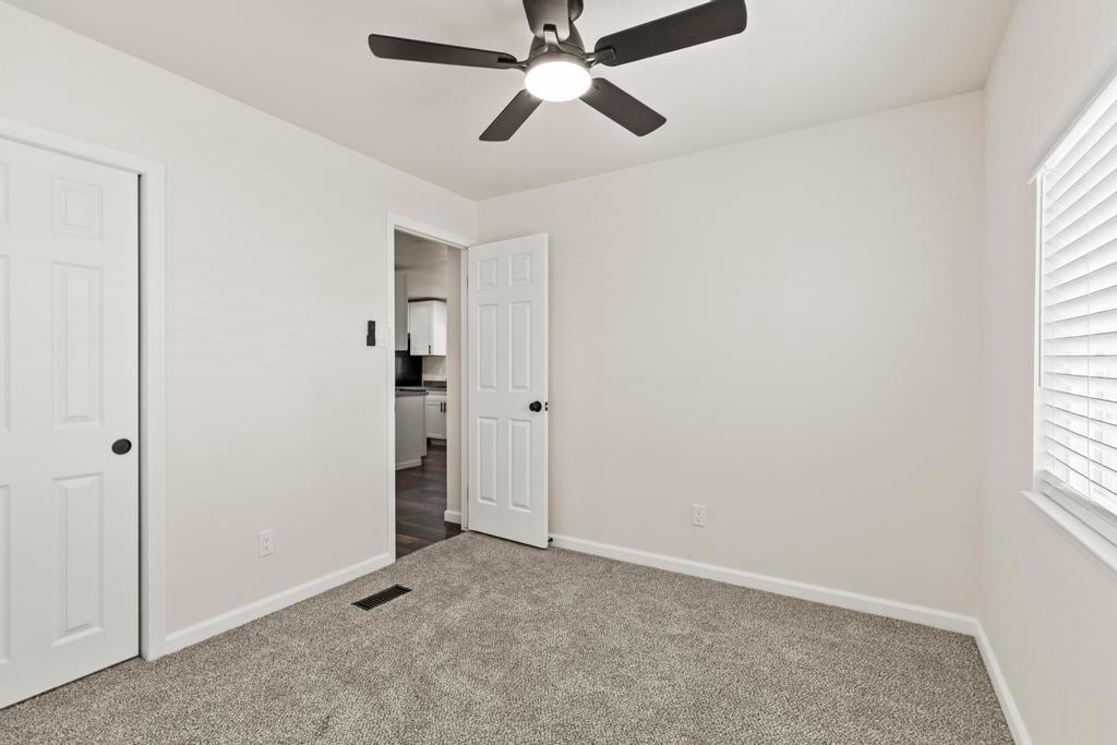 7600 Golden Eye Lane, Unit 43 Citrus Heights, CA 95621 - Photo 26 of 39 an empty room with windows and fan