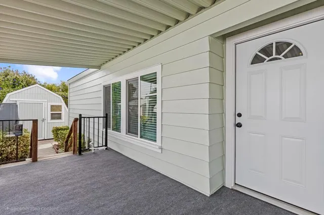 a view of an house with porch