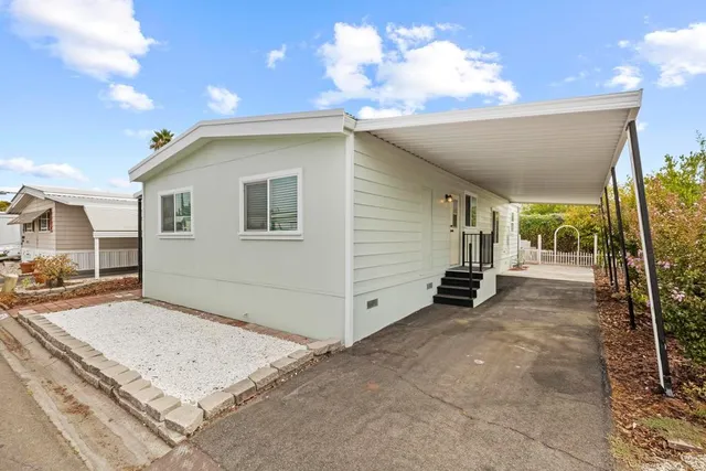 a view of a house with a patio