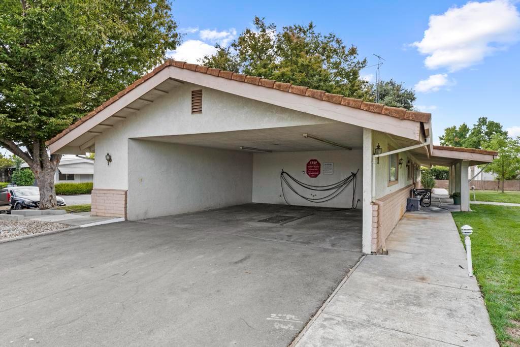 7600 Golden Eye Lane, Unit 43 Citrus Heights, CA 95621 - Photo 36 of 39 a view of a house with a yard and garage