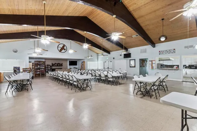 a group of people sitting in a room