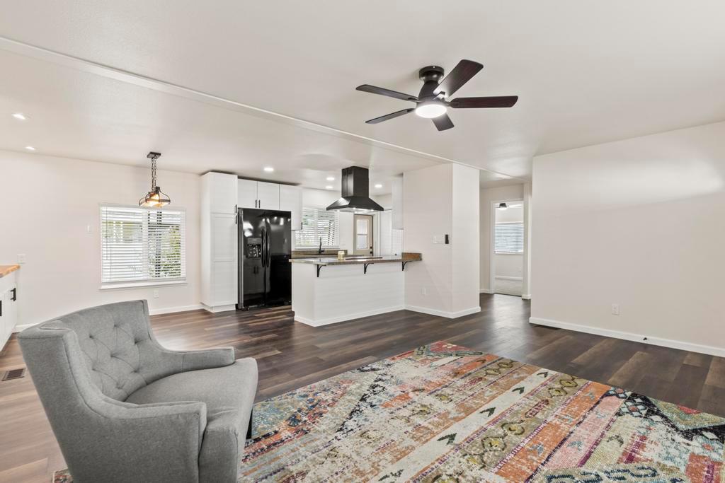 7600 Golden Eye Lane, Unit 43 Citrus Heights, CA 95621 - Photo 4 of 39 a living room with furniture and a wooden floor