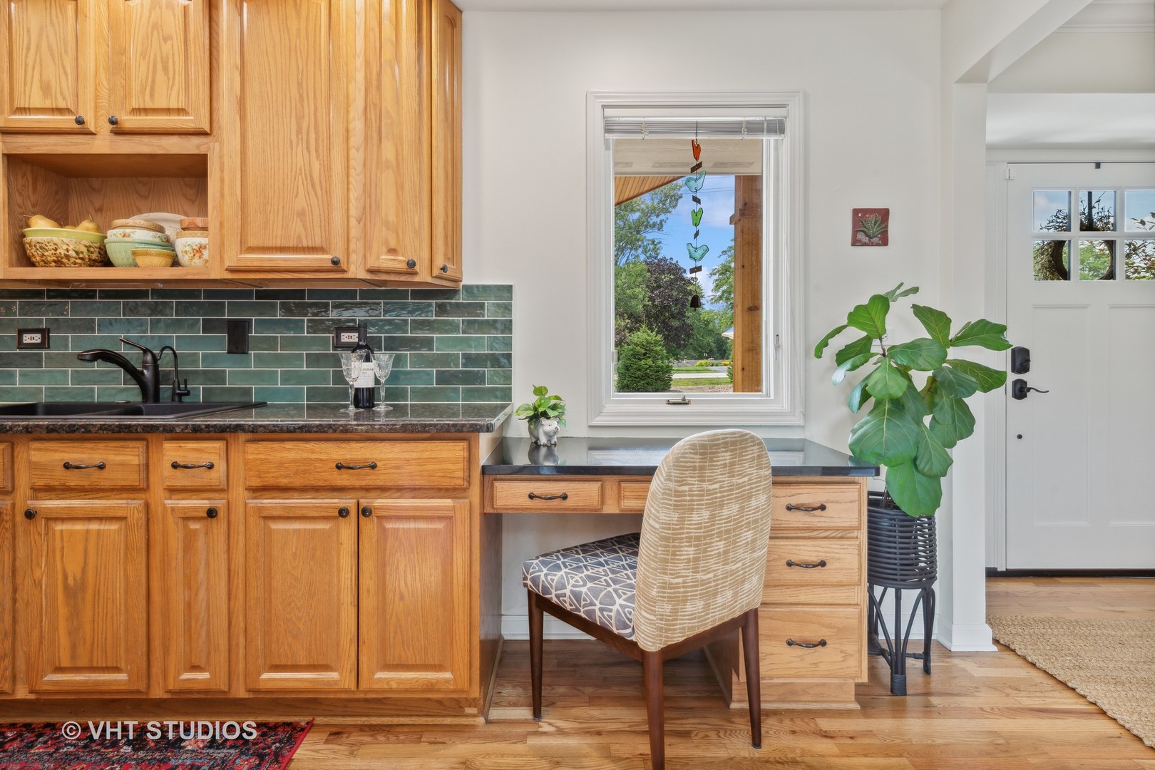 831 Ela Road Inverness, IL 60067 - Photo 15 of 46 a dining table chair next to a window with wooden floor