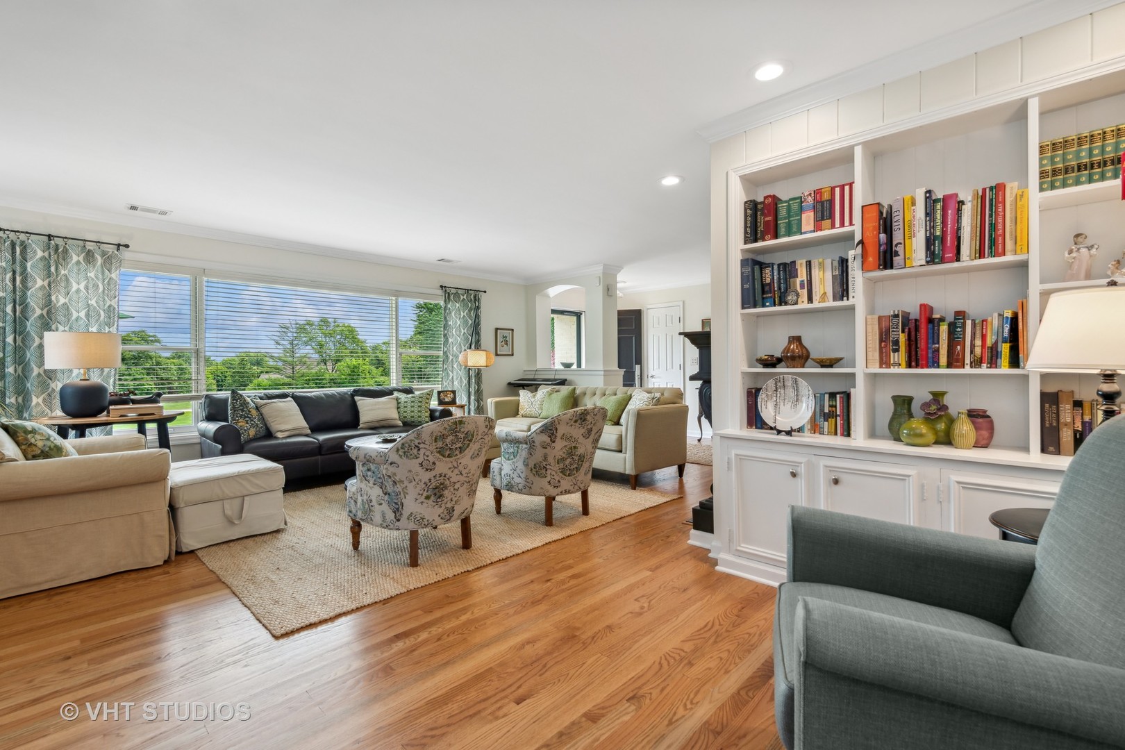 831 Ela Road Inverness, IL 60067 - Photo 23 of 46 a living room with furniture and a book shelf