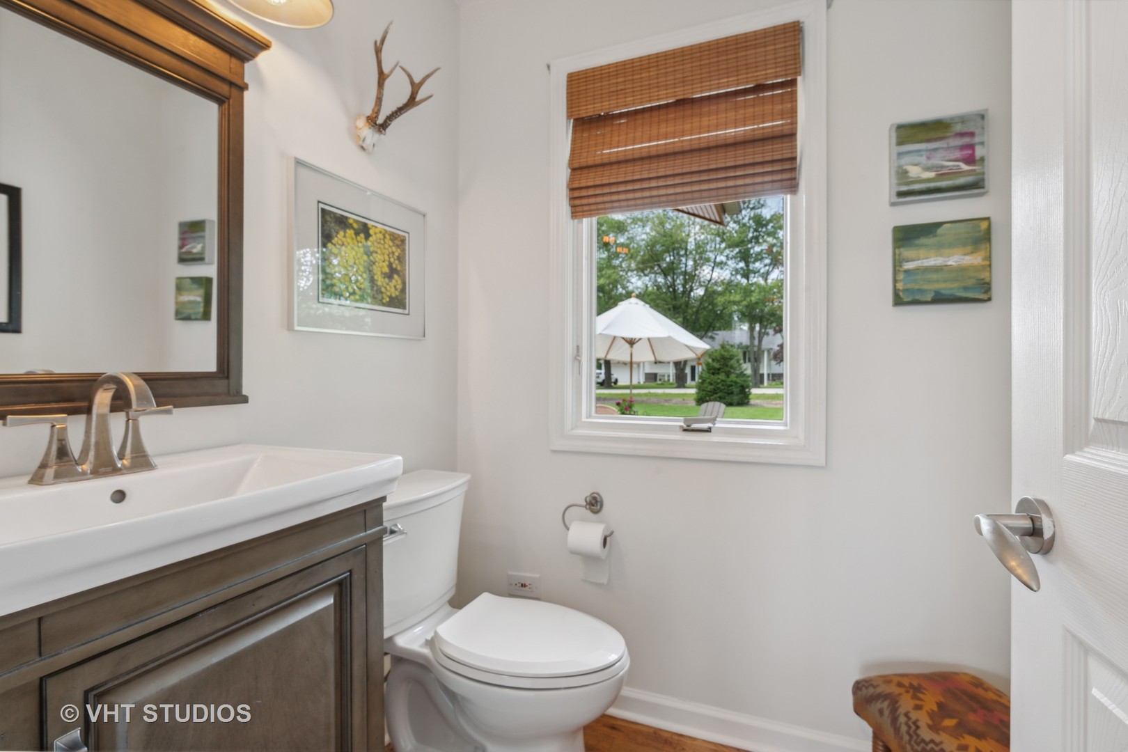 831 Ela Road Inverness, IL 60067 - Photo 25 of 46 a white toilet sitting next to a bathroom sink
