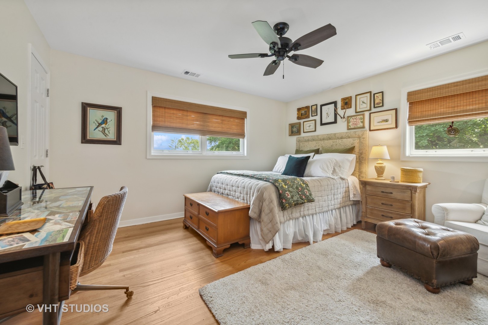 831 Ela Road Inverness, IL 60067 - Photo 26 of 46 a bedroom with a bed a couch and a chandelier