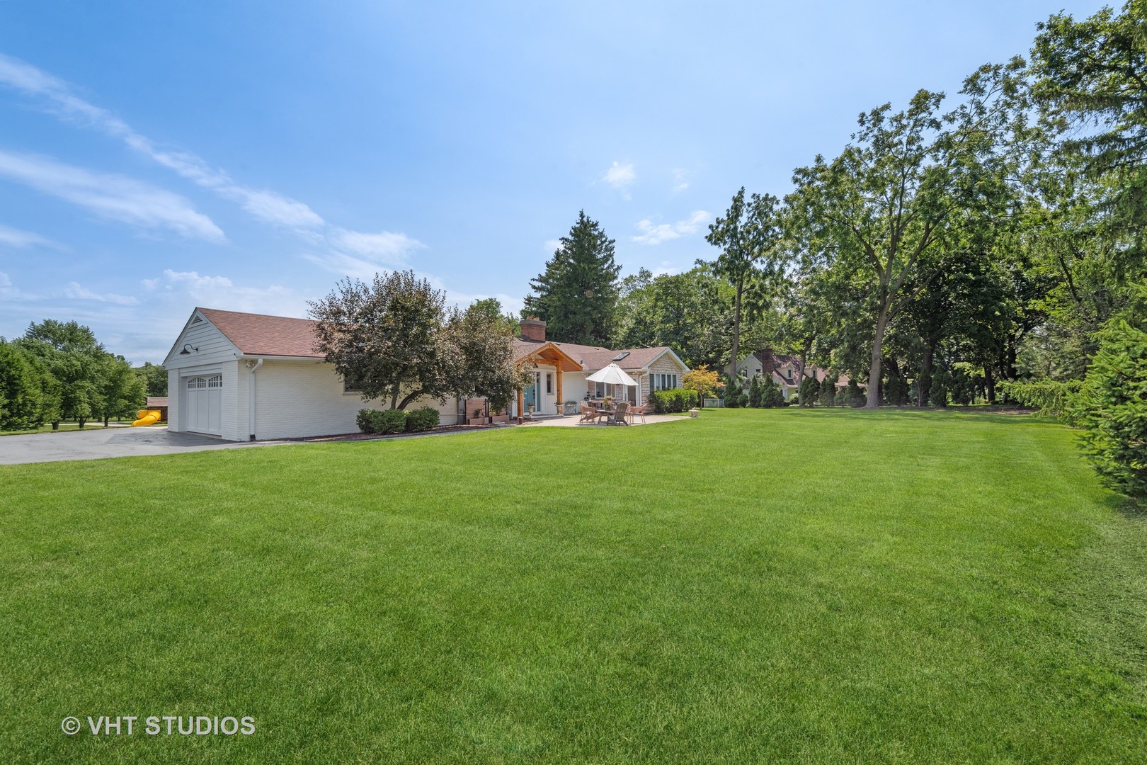 831 Ela Road Inverness, IL 60067 - Photo 39 of 46 a view of a house with a yard