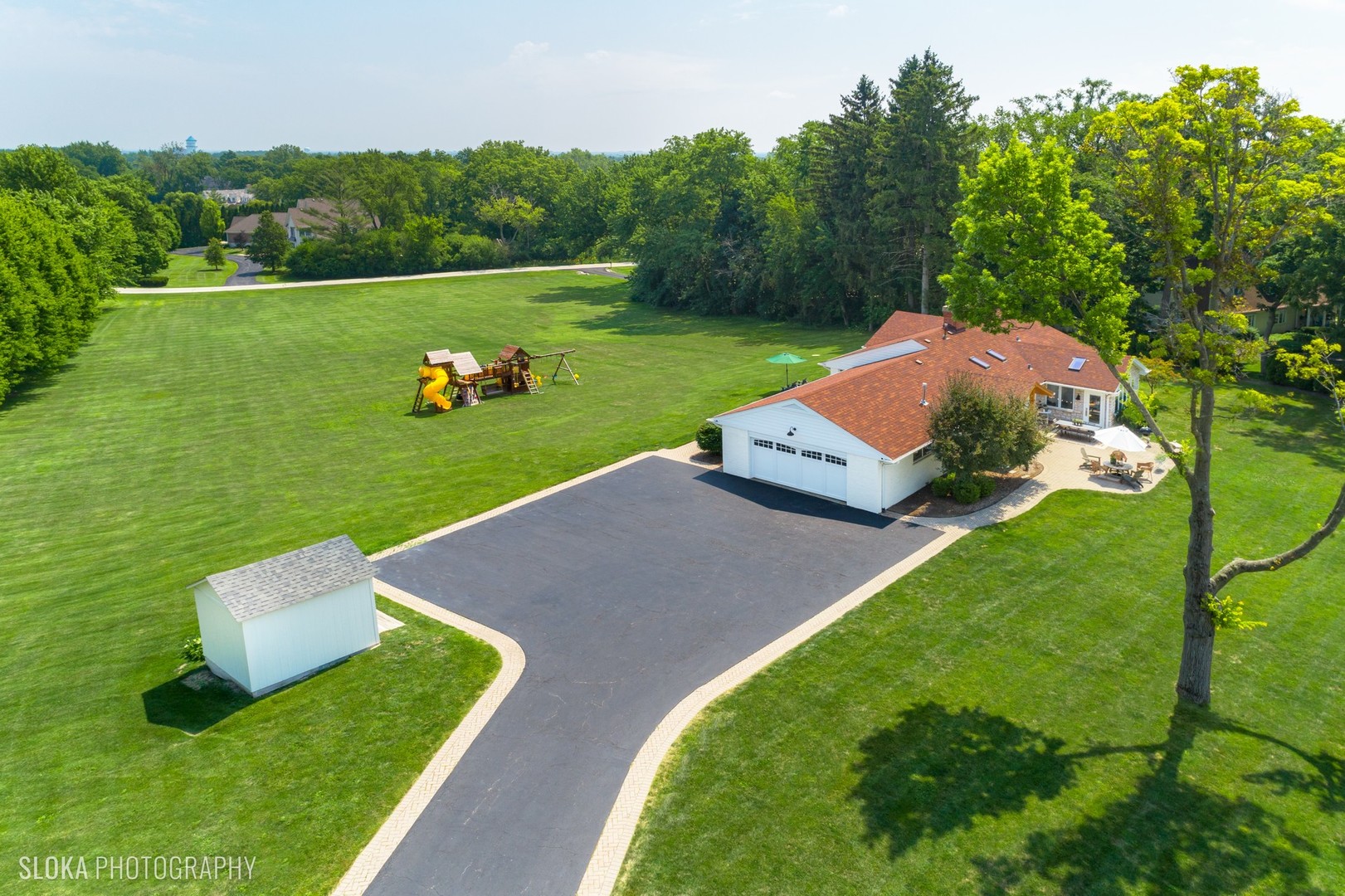 831 Ela Road Inverness, IL 60067 - Photo 40 of 46 a view of a garden with lawn chairs