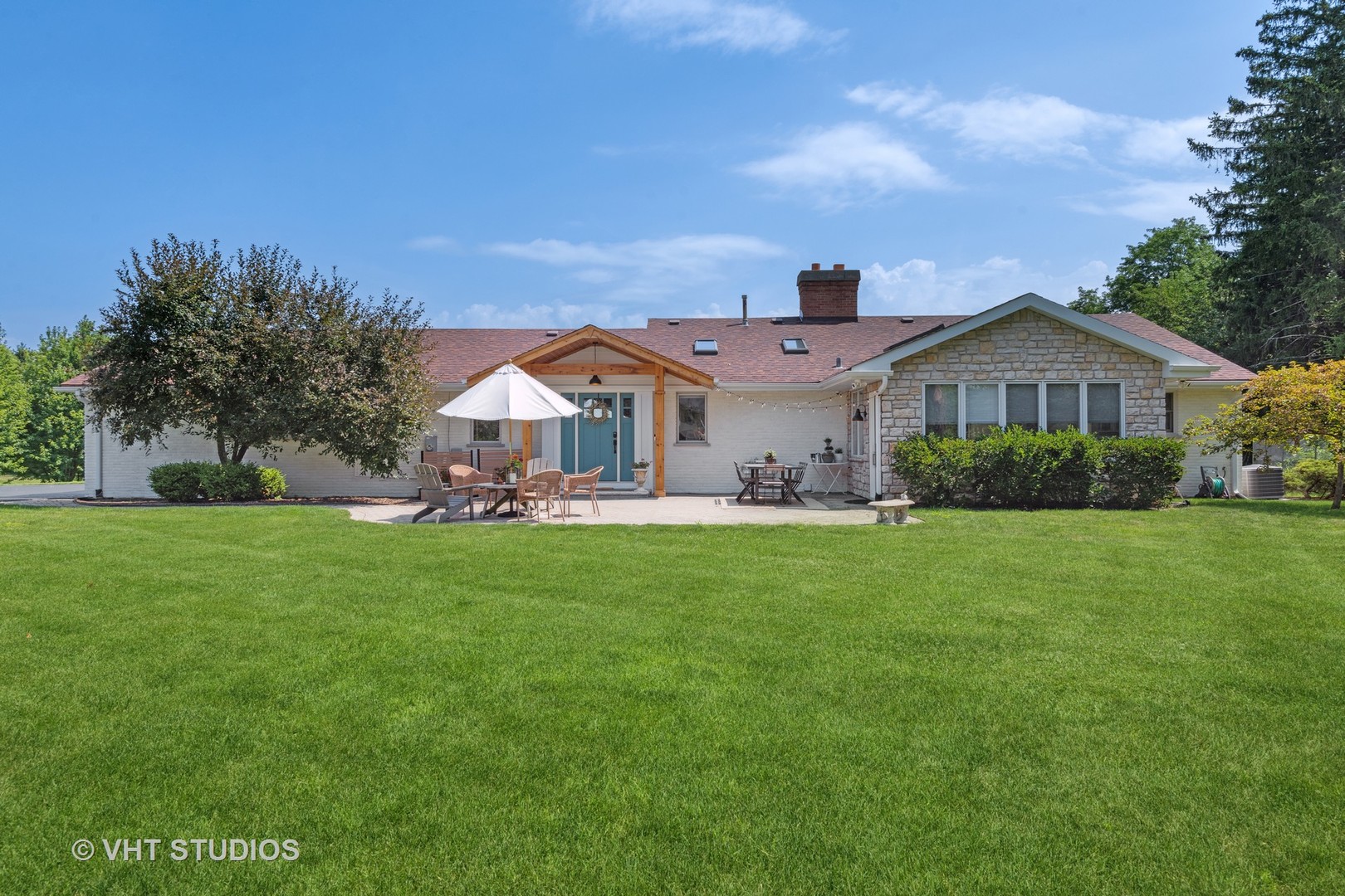 831 Ela Road Inverness, IL 60067 - Photo 5 of 46 a front view of a house with garden