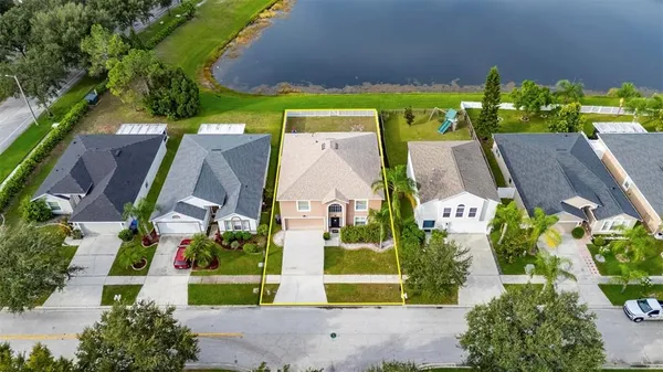 an aerial view of a house with a garden