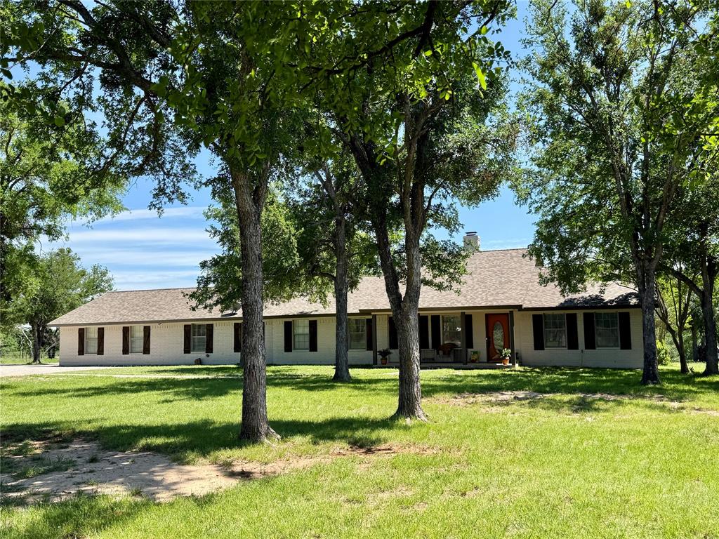 2007 Deep Water Road May, TX 76857 - Photo 2 of 40 a front view of a house with a yard