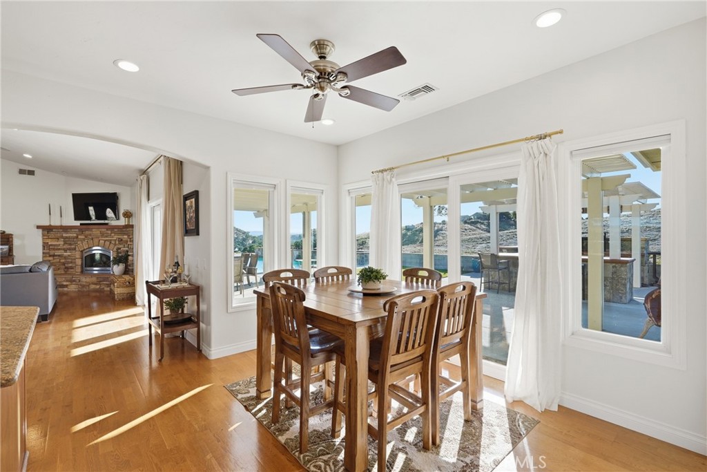 220 Cook Court Templeton, CA 93465 - Photo 12 of 45 a view of a dining room with furniture window and wooden floor