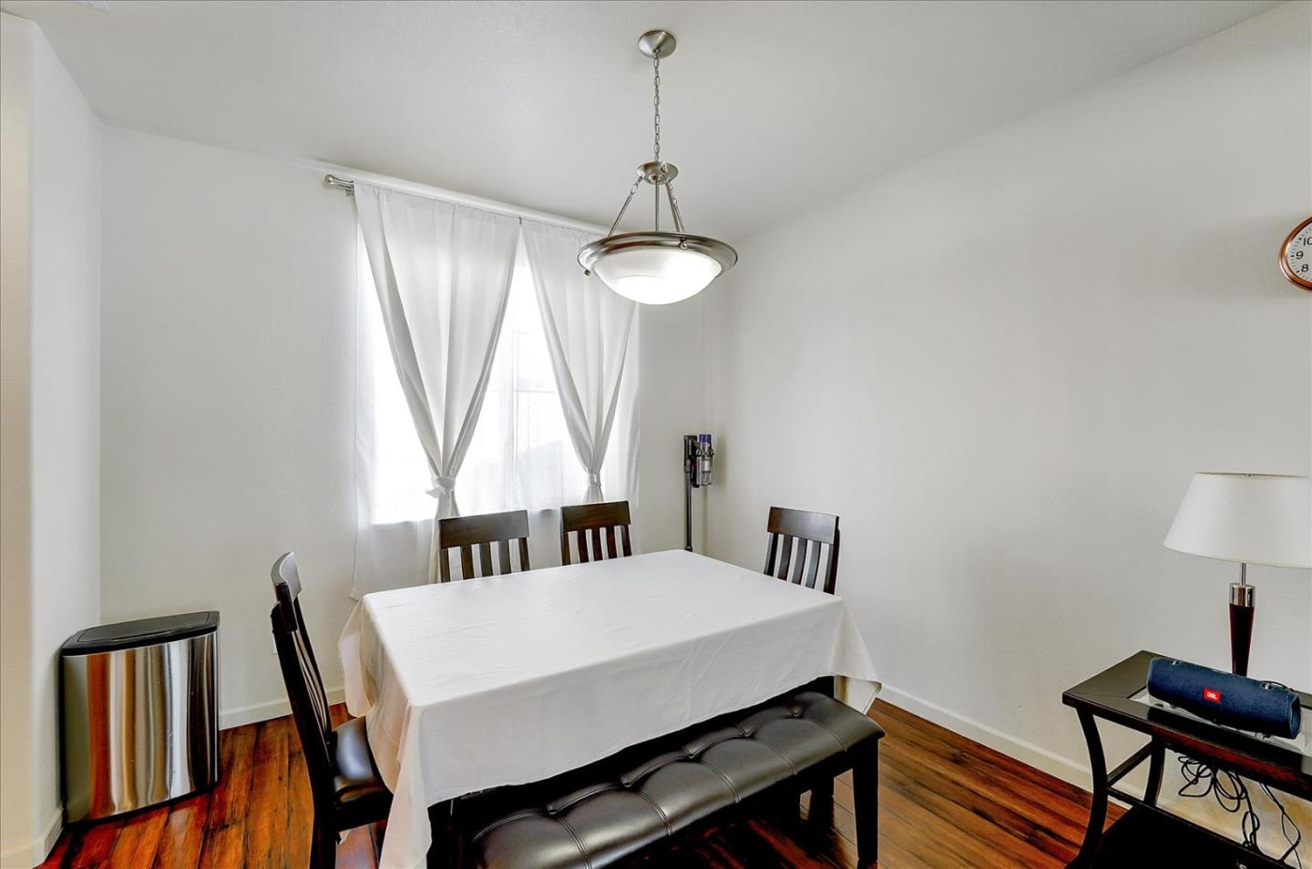18413 Ruby Lane Morgan Hill, CA 95037 - Photo 17 of 33 a view of a room with furniture window and wooden floor