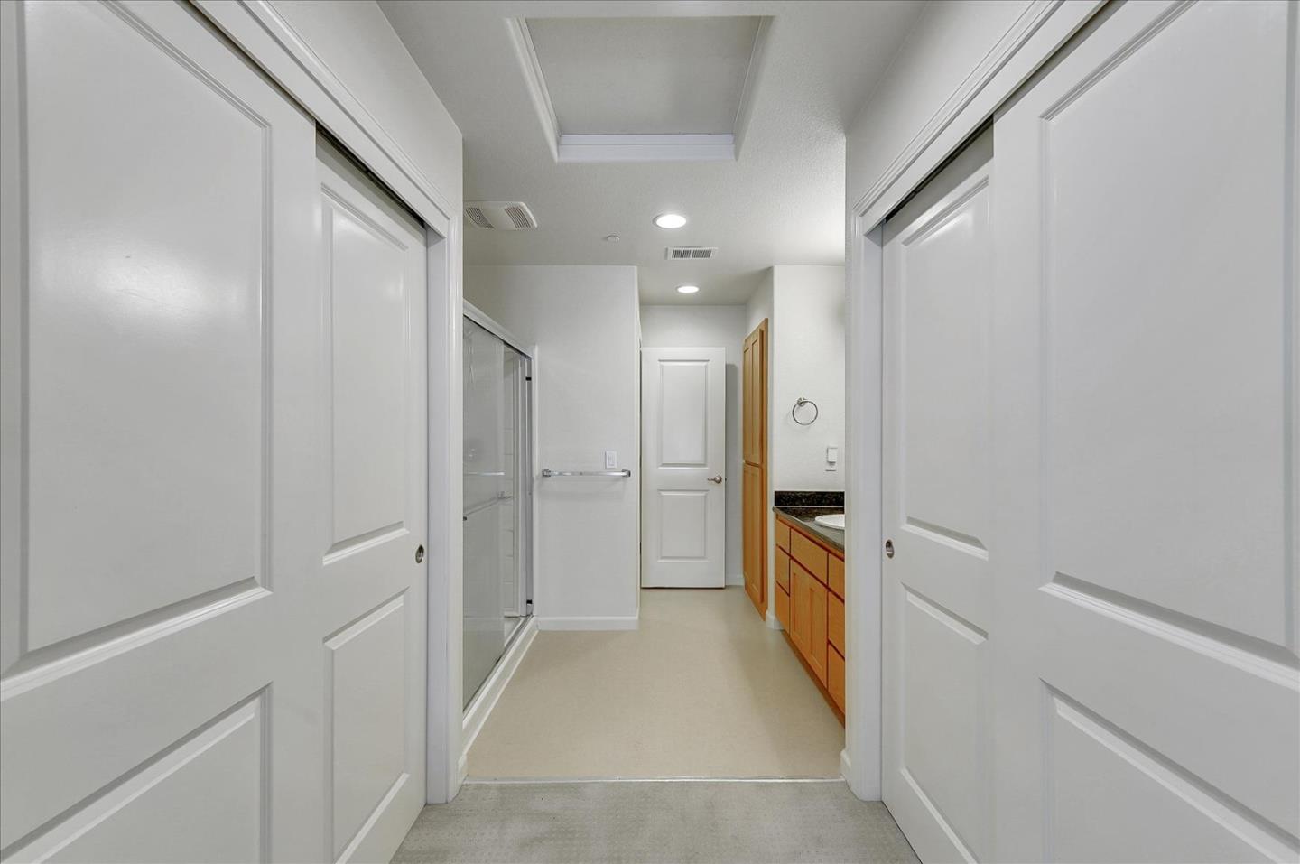 18413 Ruby Lane Morgan Hill, CA 95037 - Photo 28 of 33 a bathroom with a double vanity sink and a shower