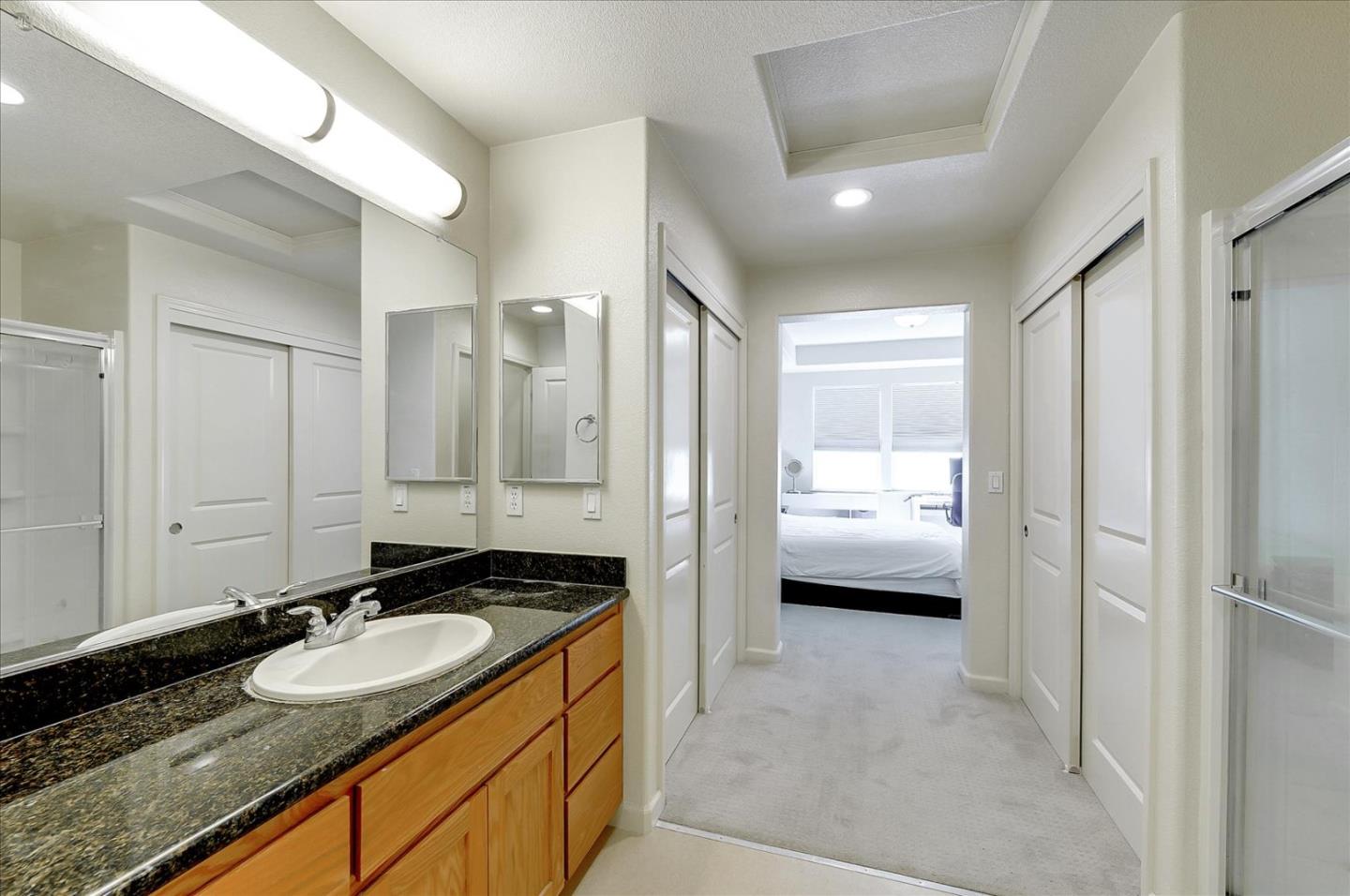 18413 Ruby Lane Morgan Hill, CA 95037 - Photo 30 of 33 a en suite bathroom with a sink a toilet and a shower