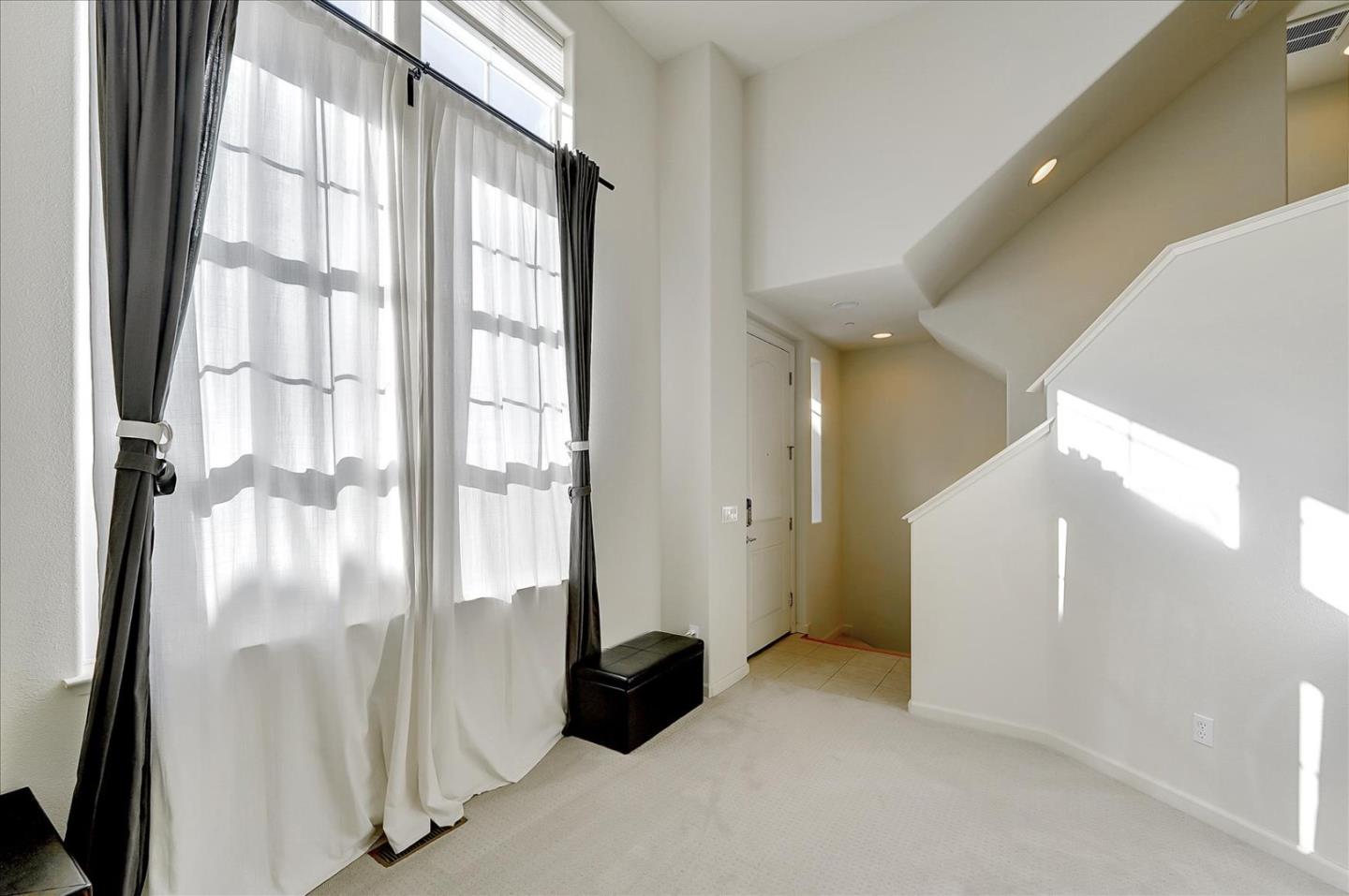 18413 Ruby Lane Morgan Hill, CA 95037 - Photo 5 of 33 a view of a big room with windows and wardrobe