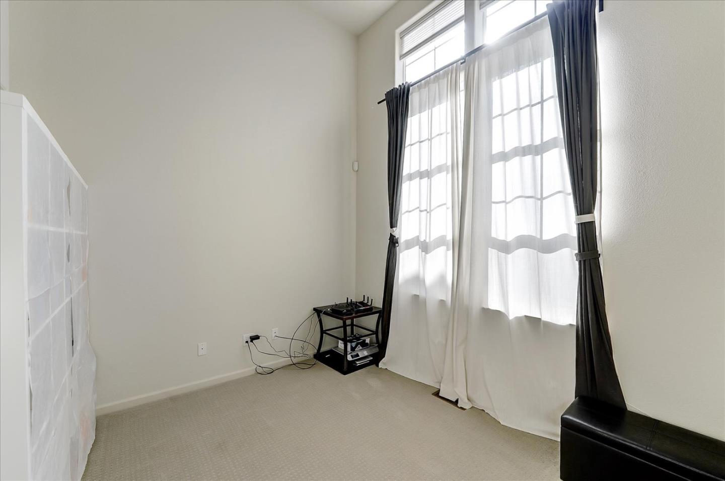 18413 Ruby Lane Morgan Hill, CA 95037 - Photo 6 of 33 a view of an empty room and a window