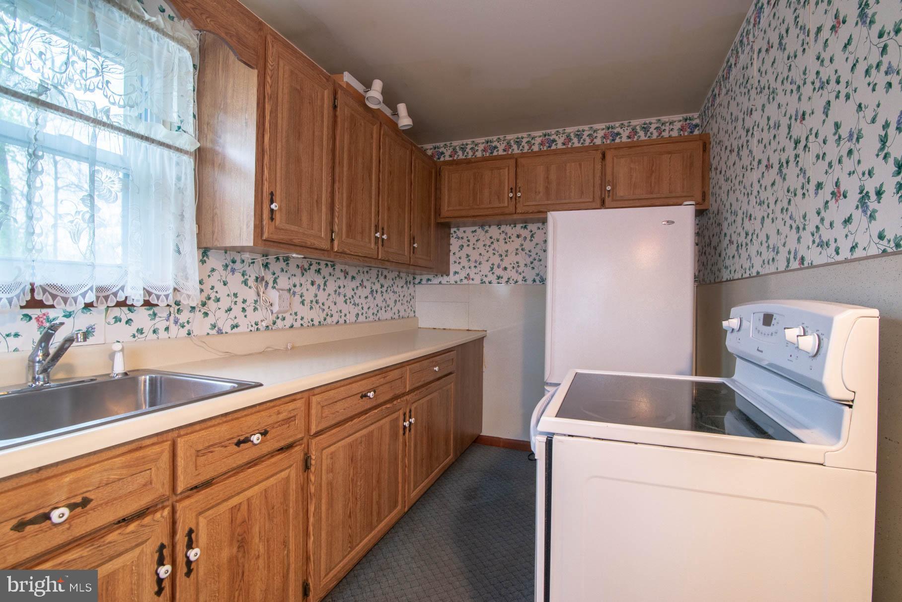 5061 Rippling Run Road Red Lion, PA 17356 - Photo 12 of 44 a utility room with dryer and washer