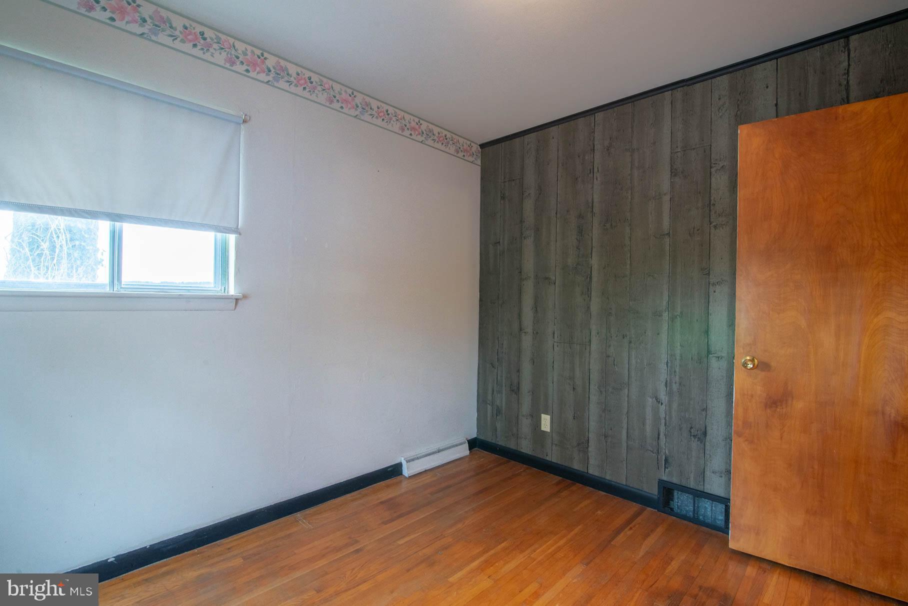 5061 Rippling Run Road Red Lion, PA 17356 - Photo 22 of 44 an empty room with windows