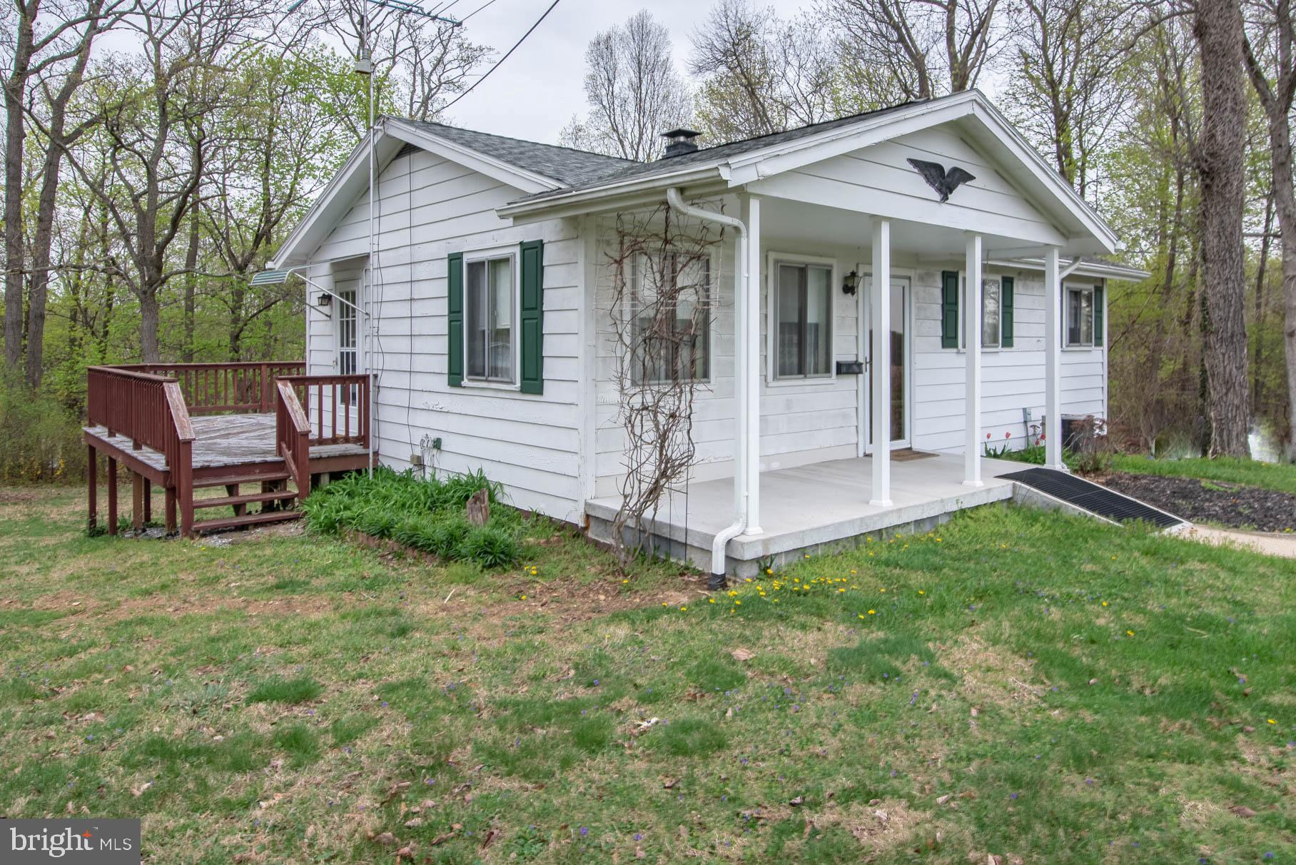 5061 Rippling Run Road Red Lion, PA 17356 - Photo 33 of 44 a view of a house with a yard and sitting area