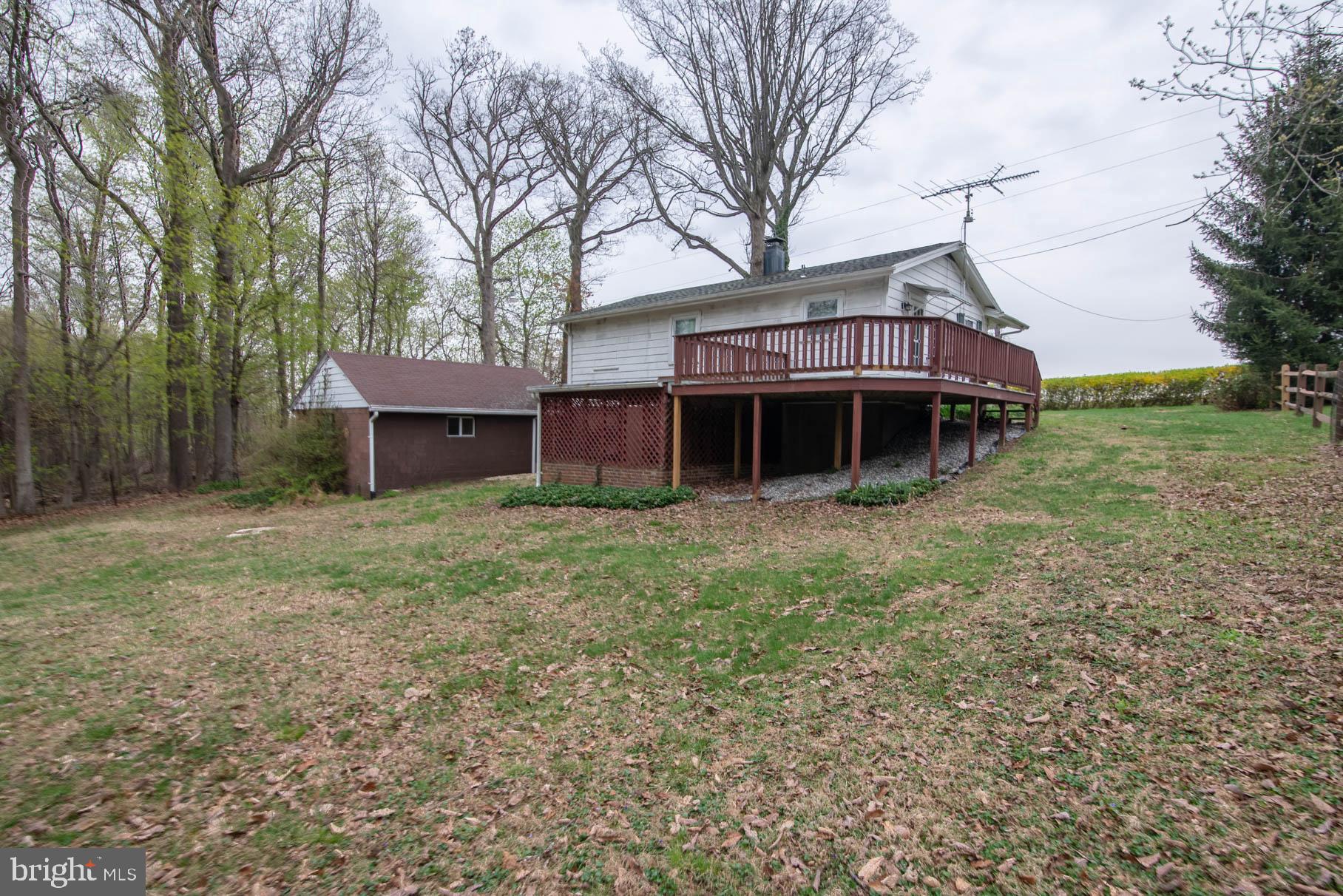 5061 Rippling Run Road Red Lion, PA 17356 - Photo 39 of 44 a view of a house with a yard