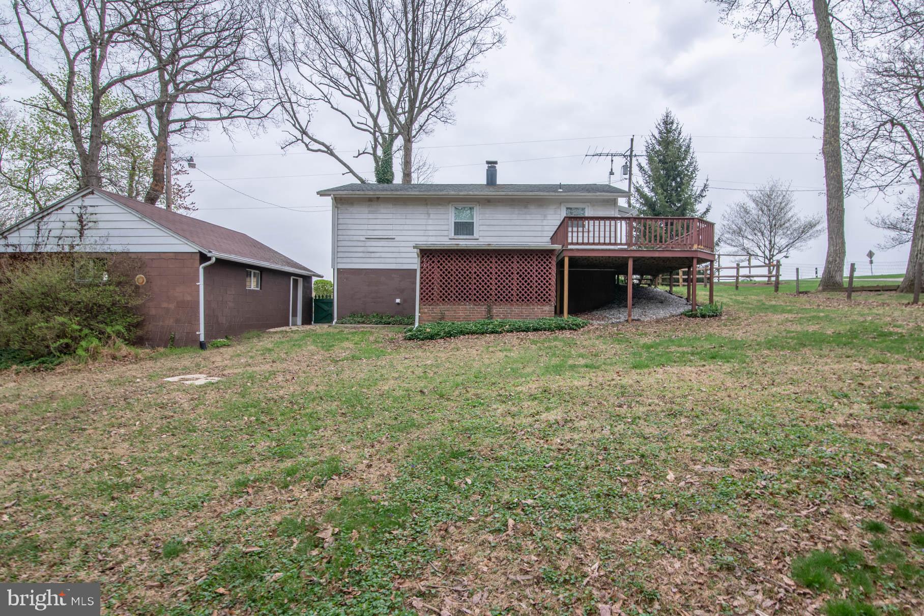 5061 Rippling Run Road Red Lion, PA 17356 - Photo 40 of 44 a view of a house with a yard and tree s