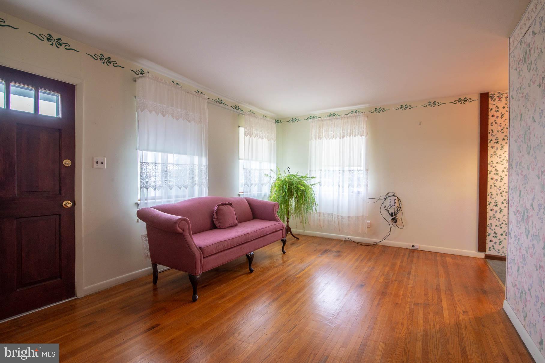 5061 Rippling Run Road Red Lion, PA 17356 - Photo 8 of 44 a living room with furniture and wooden floor