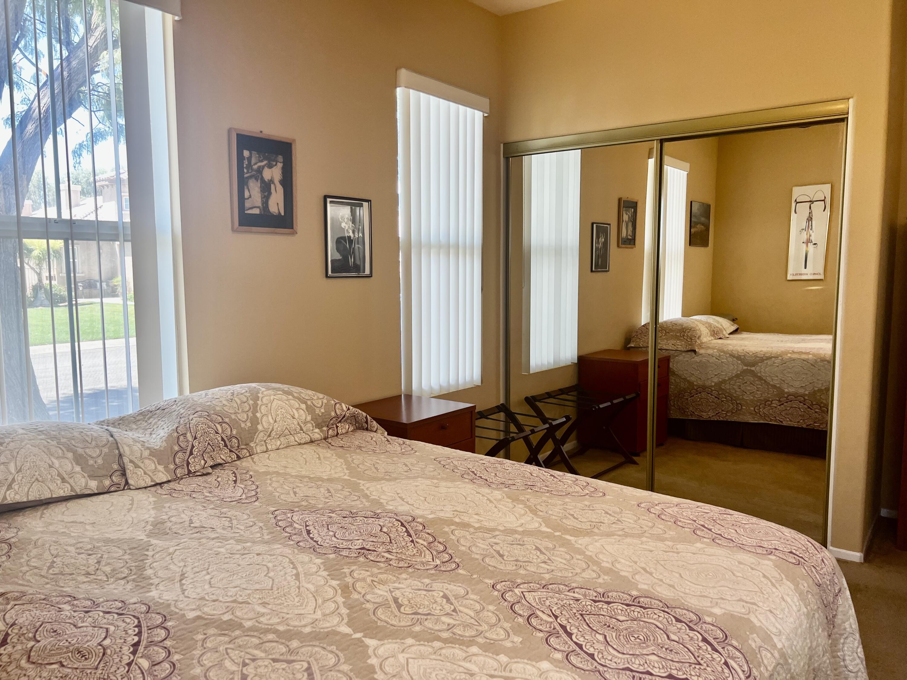 82782 Matthau Drive Indio, CA 92201 - Photo 17 of 27 a bedroom with a bed and a window