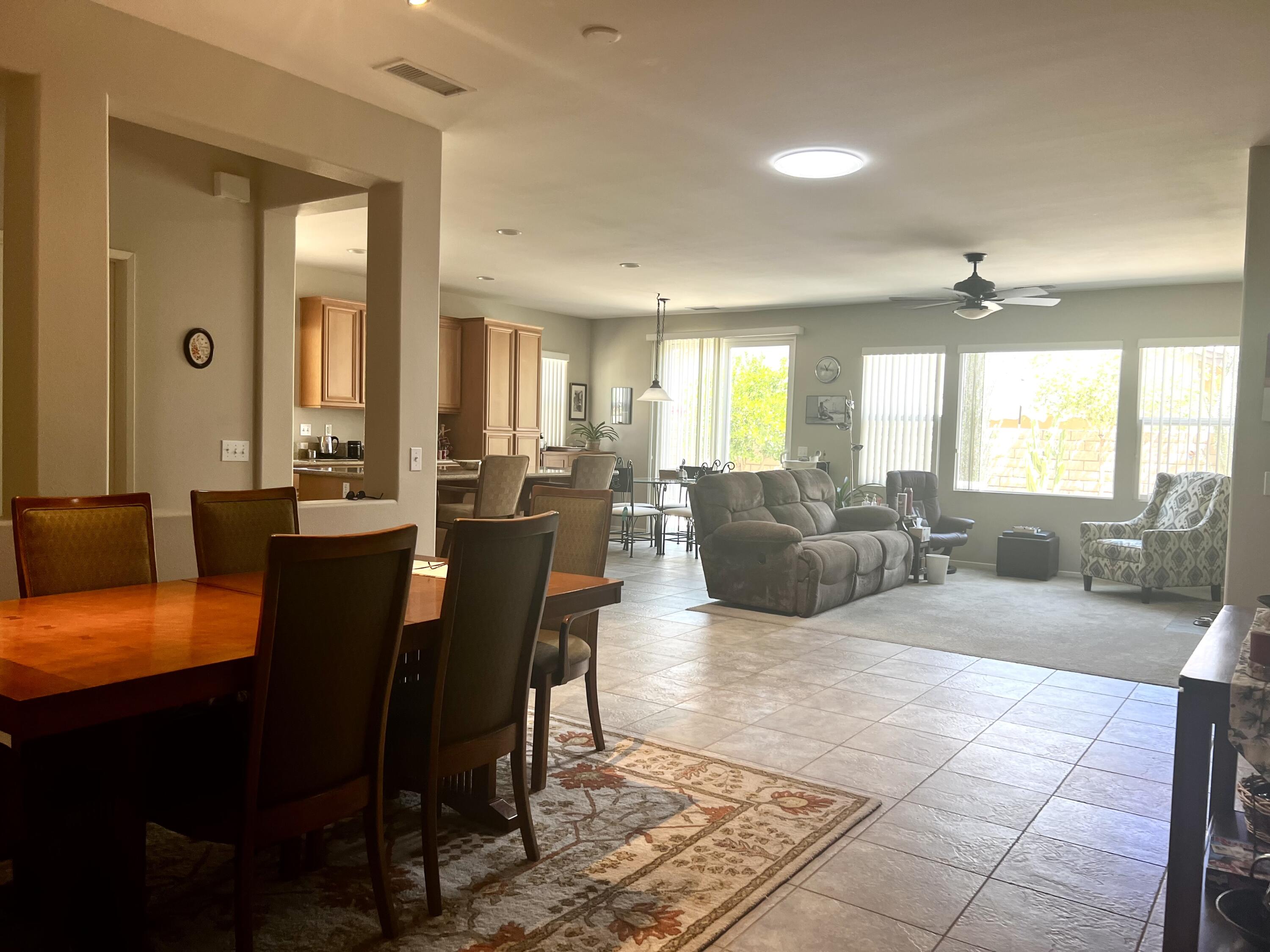 82782 Matthau Drive Indio, CA 92201 - Photo 7 of 27 a living room with furniture and a large window