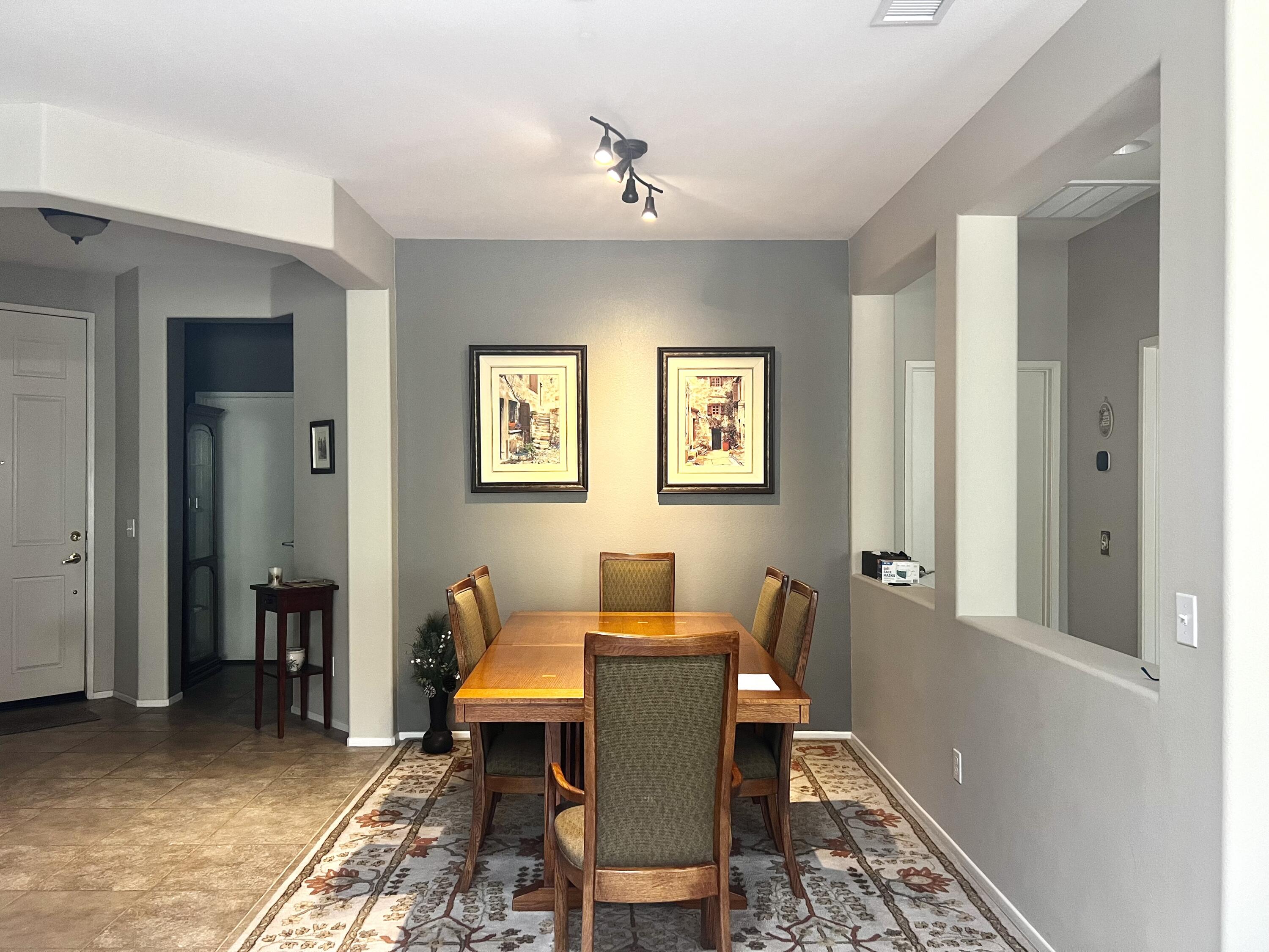 82782 Matthau Drive Indio, CA 92201 - Photo 8 of 27 a dining room with furniture and window