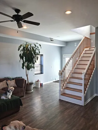 a view of entryway and livingroom with wooden floor