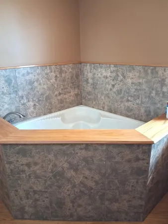 a view of a bathtub in a room