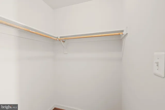 a view of small space with racks on the wall