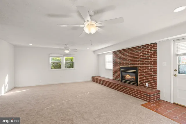 a view of a livingroom with a fireplace