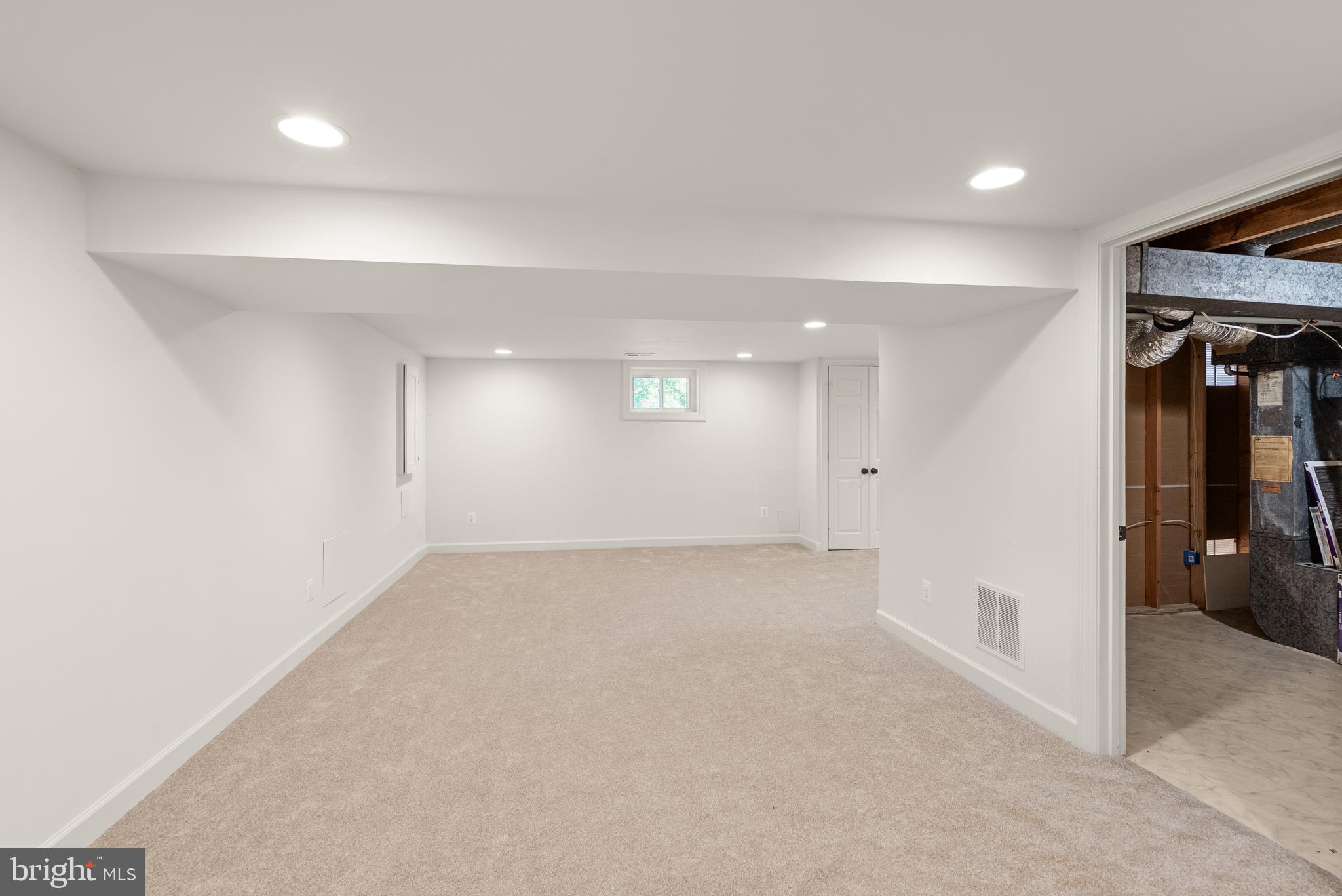 1726 Baldwin Drive McLean, VA 22101 - Photo 37 of 47 an empty room with a empty space and windows