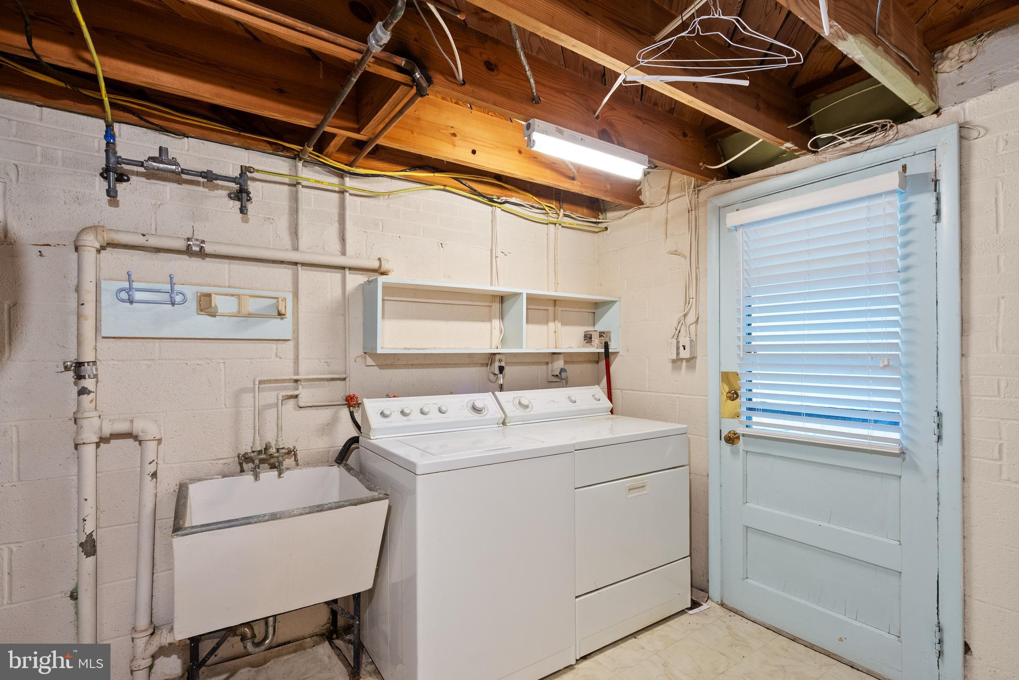 1726 Baldwin Drive McLean, VA 22101 - Photo 39 of 47 a utility room with dryer and washer