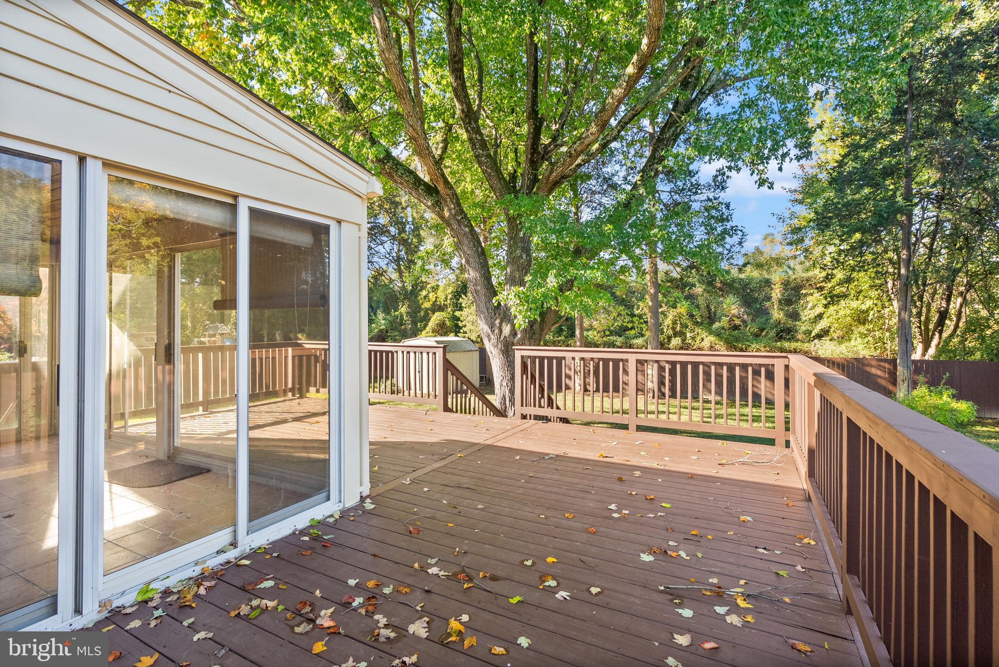 1726 Baldwin Drive McLean, VA 22101 - Photo 40 of 47 a balcony with trees in front of it