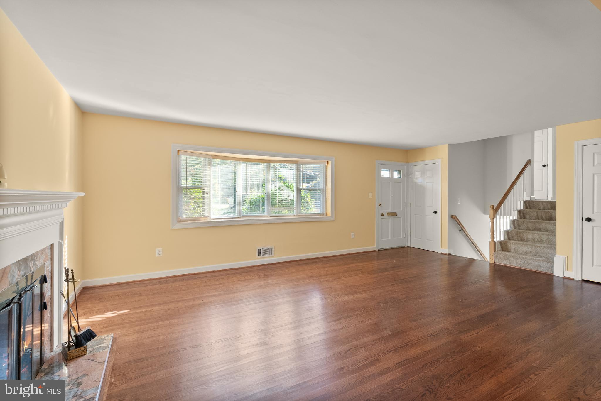1726 Baldwin Drive McLean, VA 22101 - Photo 9 of 47 wooden floor in an empty room with a fireplace