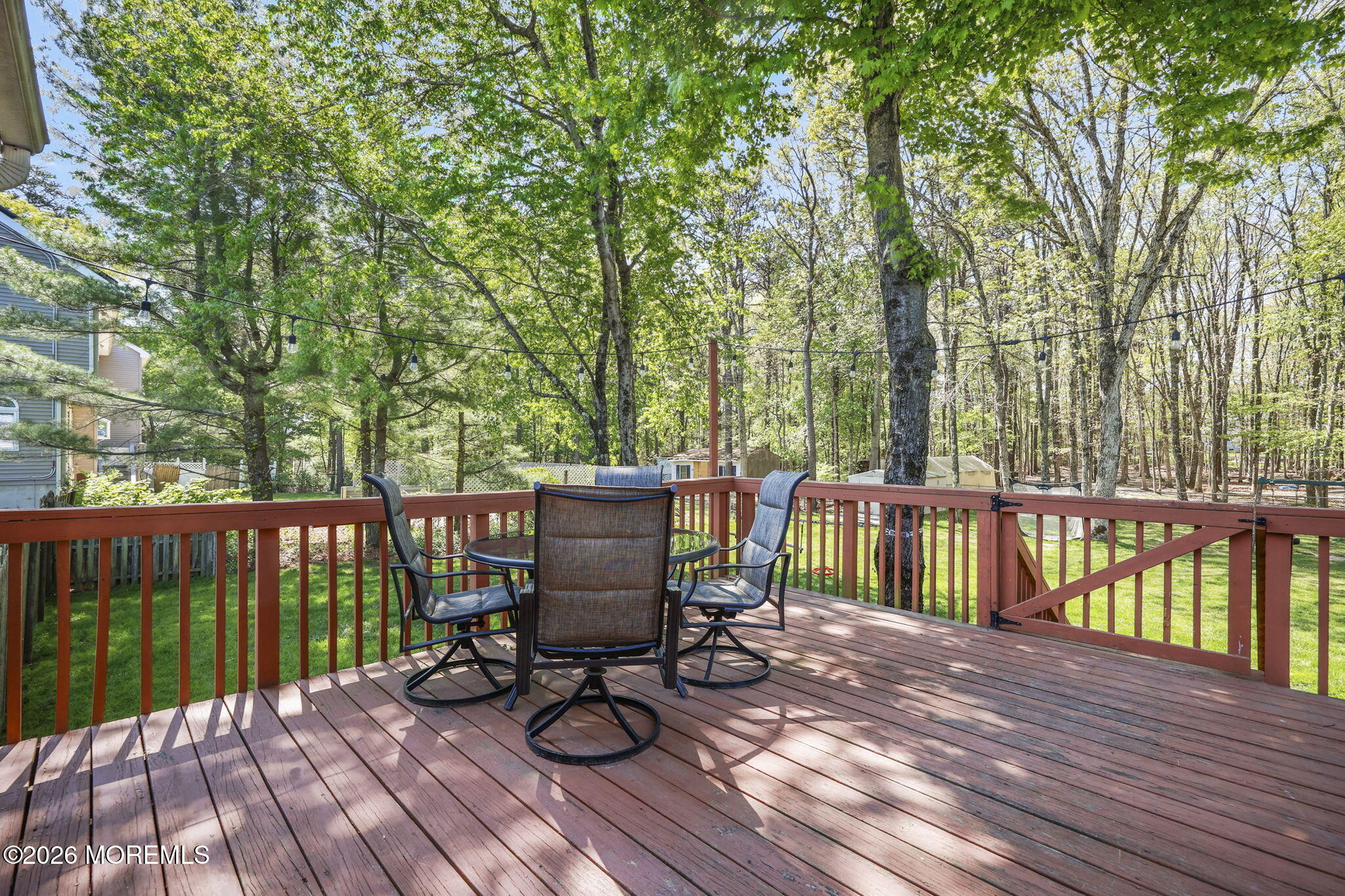 356 Leesville Road Jackson, NJ 08527 - Photo 34 of 46 a view of a deck with chairs and wooden floor