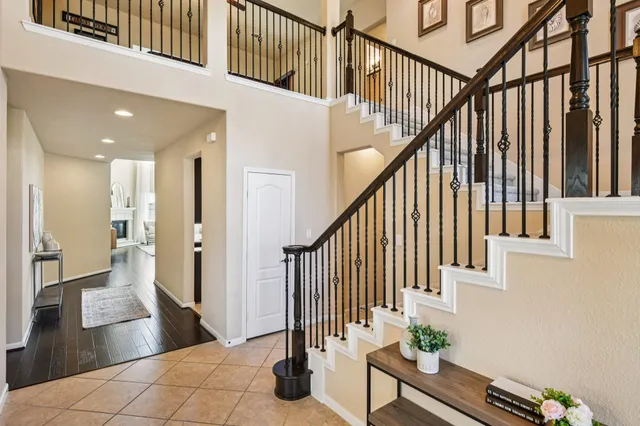 a view of living room with furniture and wooden floor