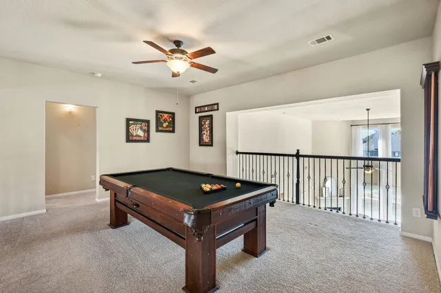 a view of entryway with wooden floor and stairs