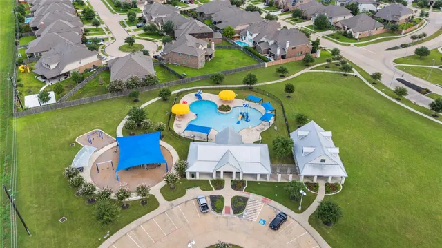 a view of a playground with basketball court