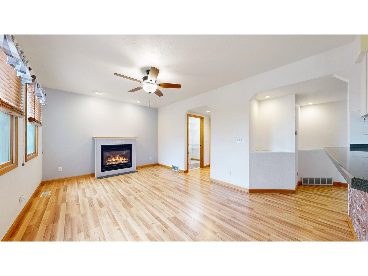 5017 West 6th Street Road Greeley, CO 80634 - Photo 10 of 42 Living room off of kitchen